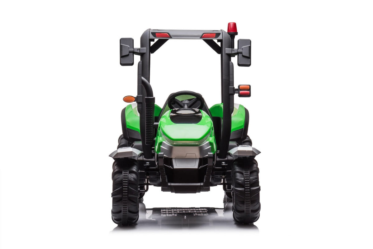 Green kids ride on tractor