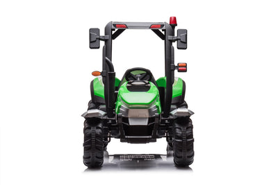 Green kids ride on tractor