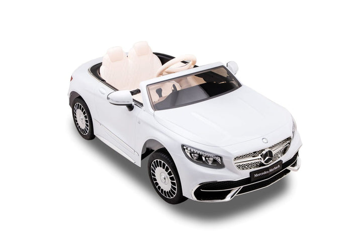 White Mercedes kids ride on car with remote
