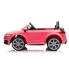 Kids ride one electric car in Pink