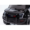 Toddler police push car in black
